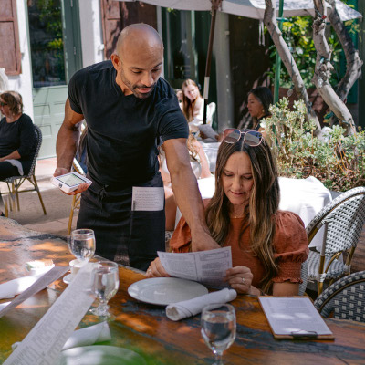 Waiter at table