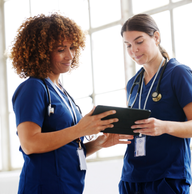 Pharmacist looking at tablet